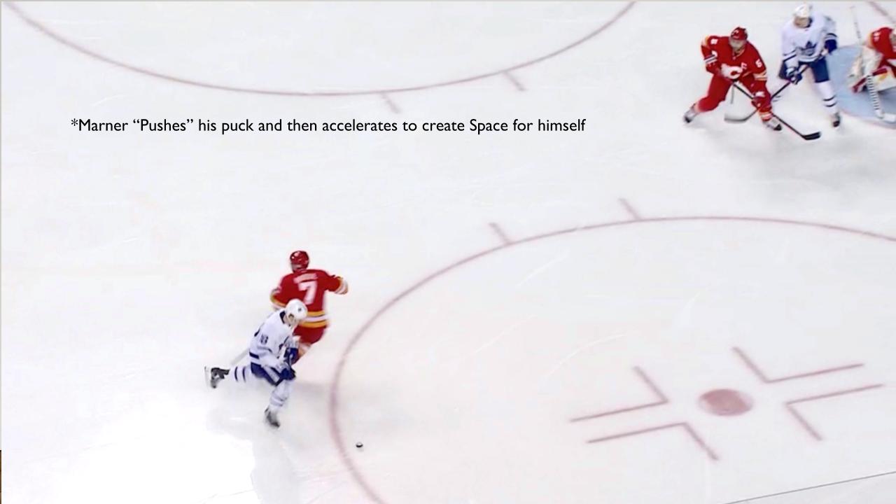 Marner pushes puck around defense